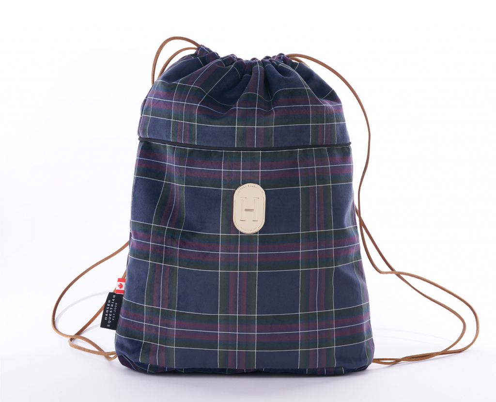 Hansen Equestrian velvet helmet bag in Burnberry plaid with a drawstring closure and padded interior for helmet protection