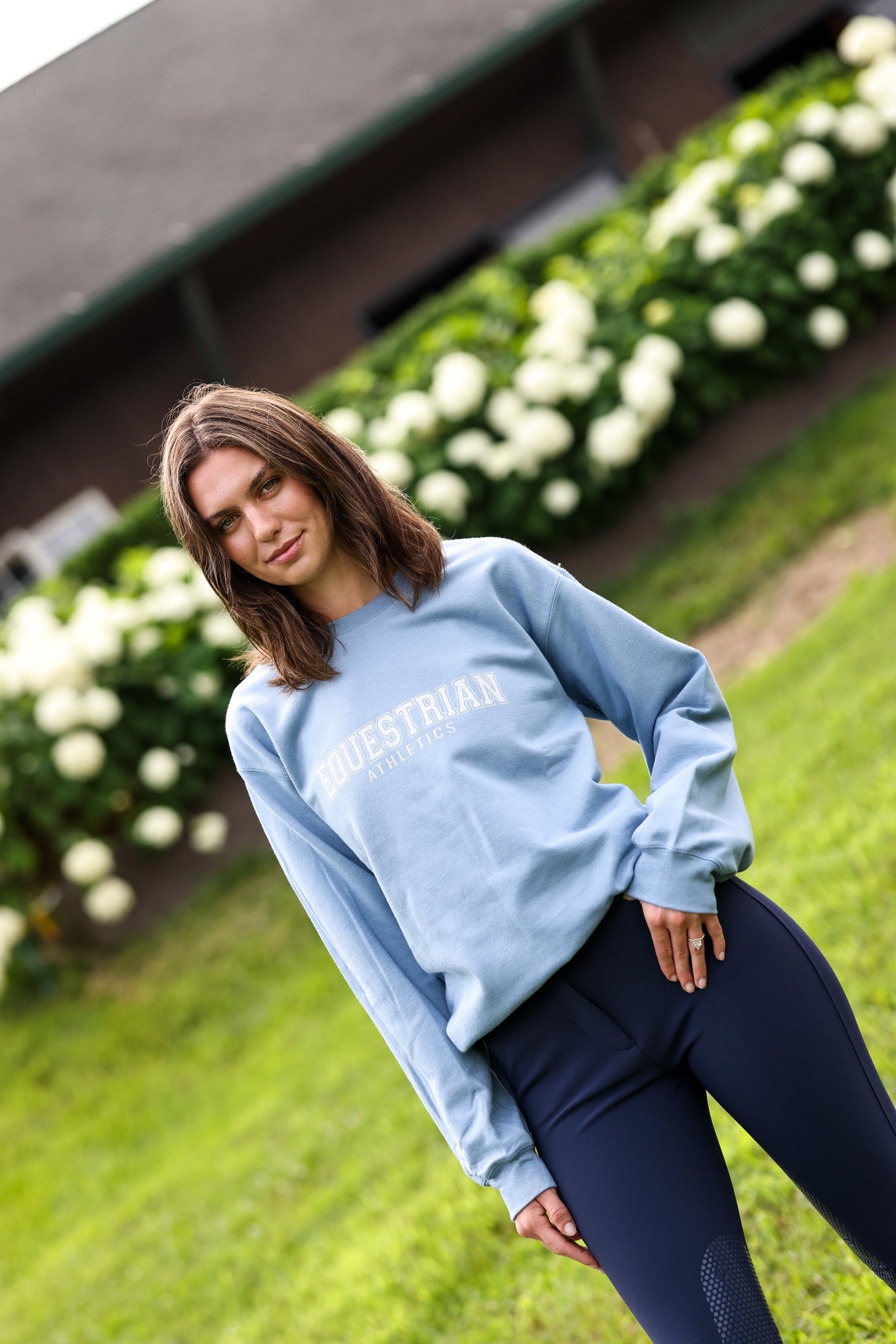 TKEQ Equestrian Athletics sweatshirt in fall 2025 colors, featuring a monogram design on a casual sweater.