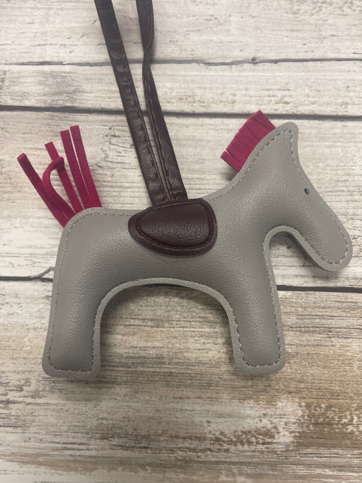 Colorful Pony Bag Charm by Vision Saddlery, featuring vibrant horse-themed design for decorative accessories.