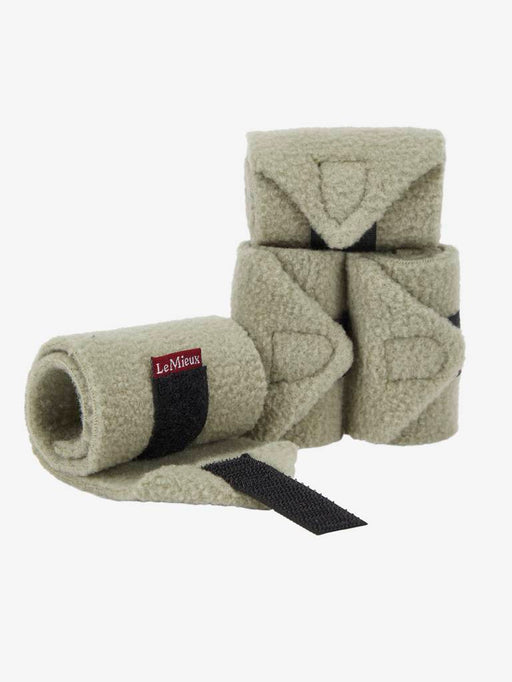 LeMieux toy pony polo bandages in various colors, shown wrapped around a toy horse for grooming and dressage play.
