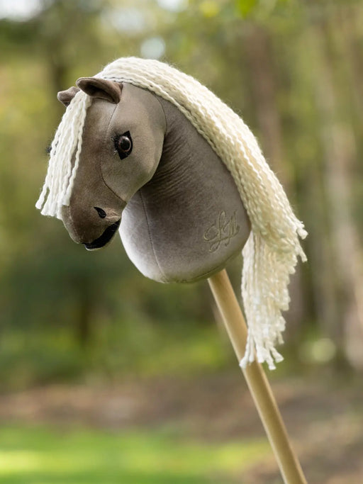 LeMieux Mini Hobby Horse Aurelia with a plush horse head and colorful bridle, designed for children's imaginative play.